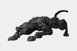 Illustration for article titled This Artist Turns Old Tires Into Dark, Disturbing Nightmare Monsters